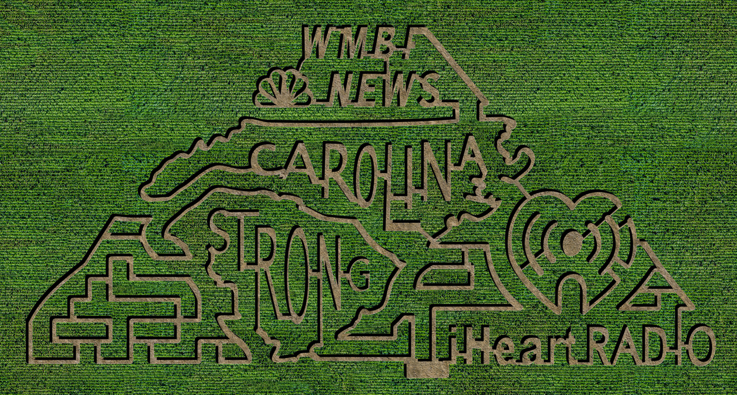 A corn maze with the words " wmbnews carolina strong heart strong strong."